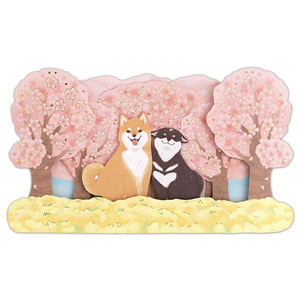 Shiba Inu dogs with cherry blossoms, flat view of the 3D pop-up card