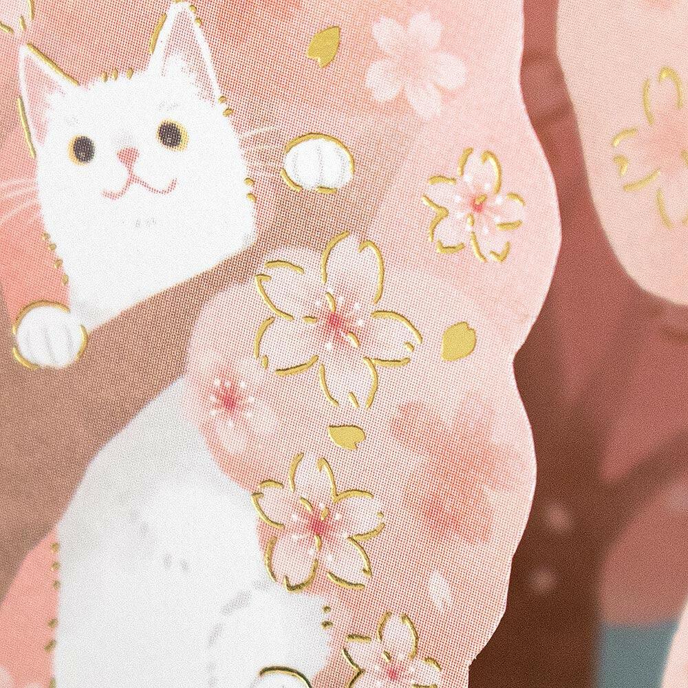 Luxurious gold foil accents on cherry blossoms, wildflowers, and playful cats, adding shimmer and elegance to this 3D pop-up greeting card.