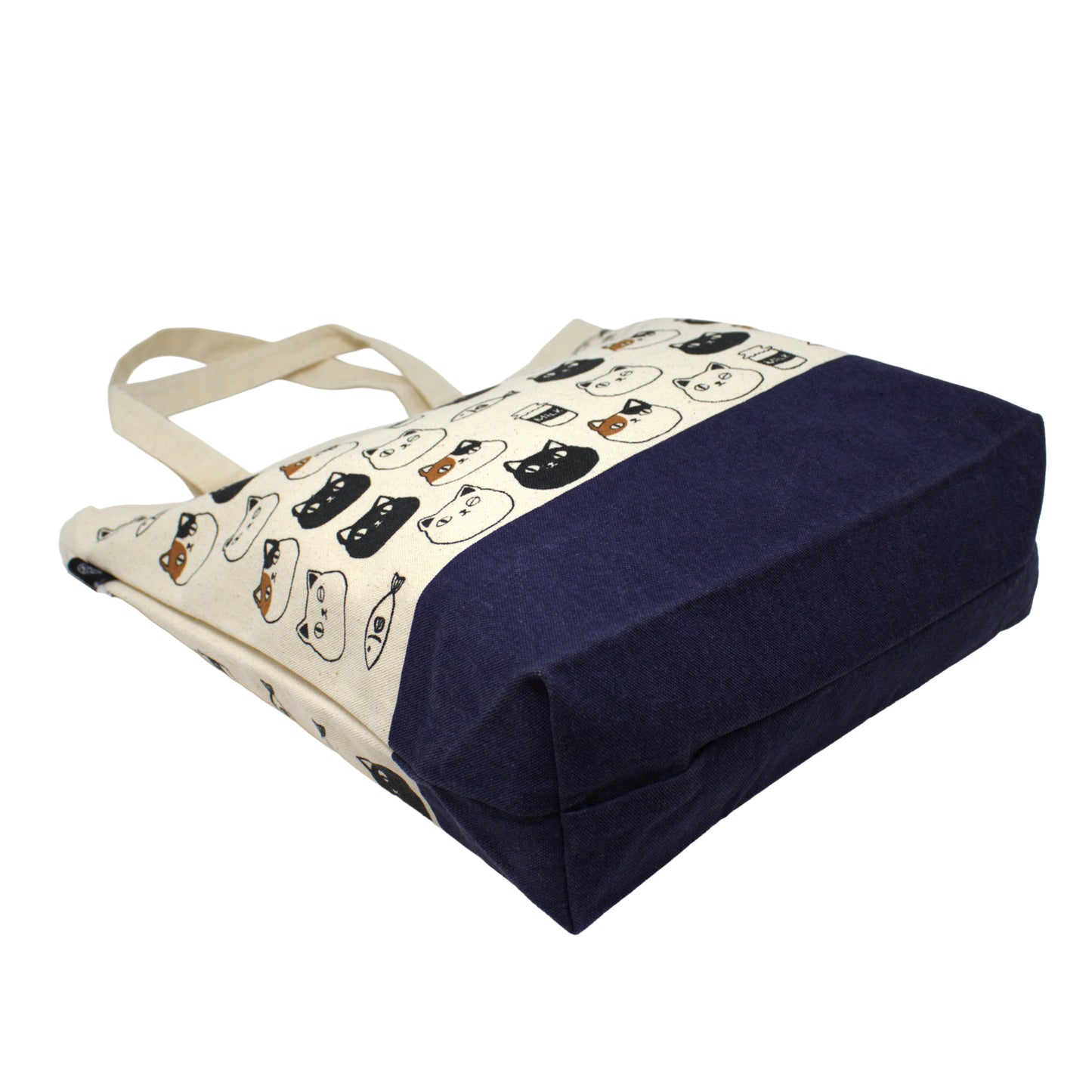 Canvas tote bag with cute cat faces of Shiro, Kuro, and Mike from the Nyan-ya series, featuring black polka dot handles and inner pocket – perfect for cat lovers.