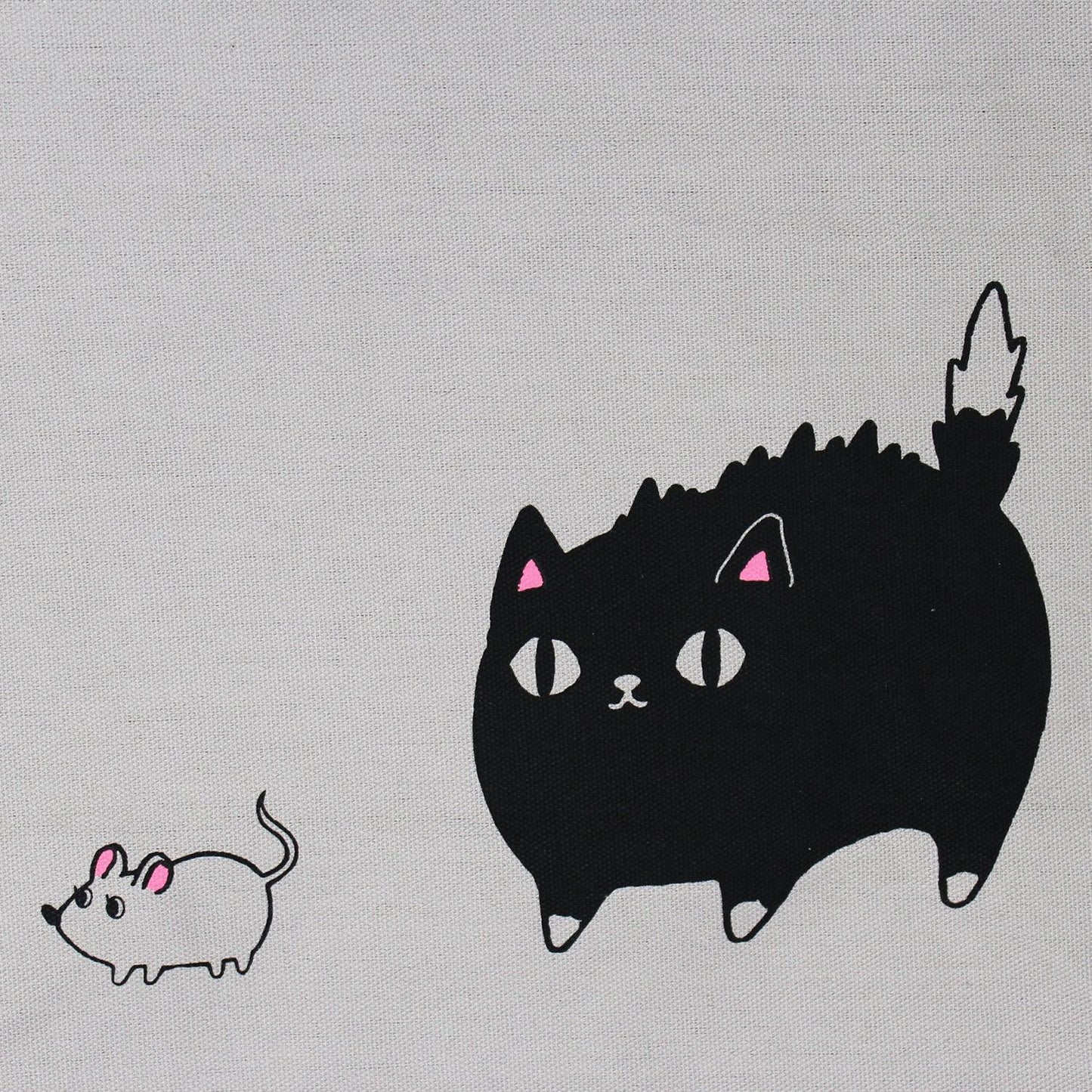 Back of tote bag featuring playful illustration of black cat and mouse – whimsical Japanese design on beige cotton canvas
