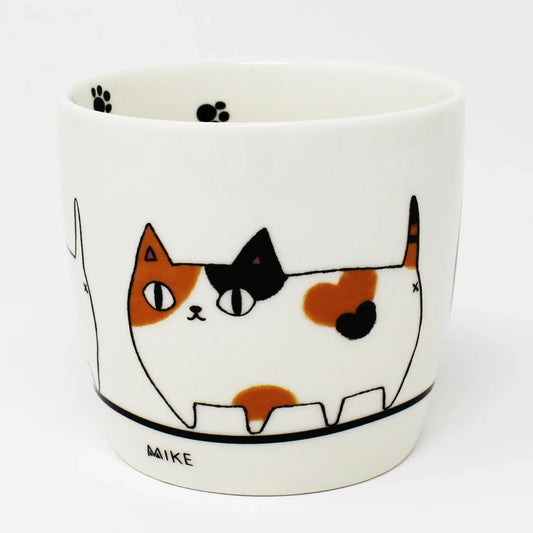 White porcelain mug with black handle and marching cat illustration – 3 Cat Brothers: Kuro, Shiro, Mile