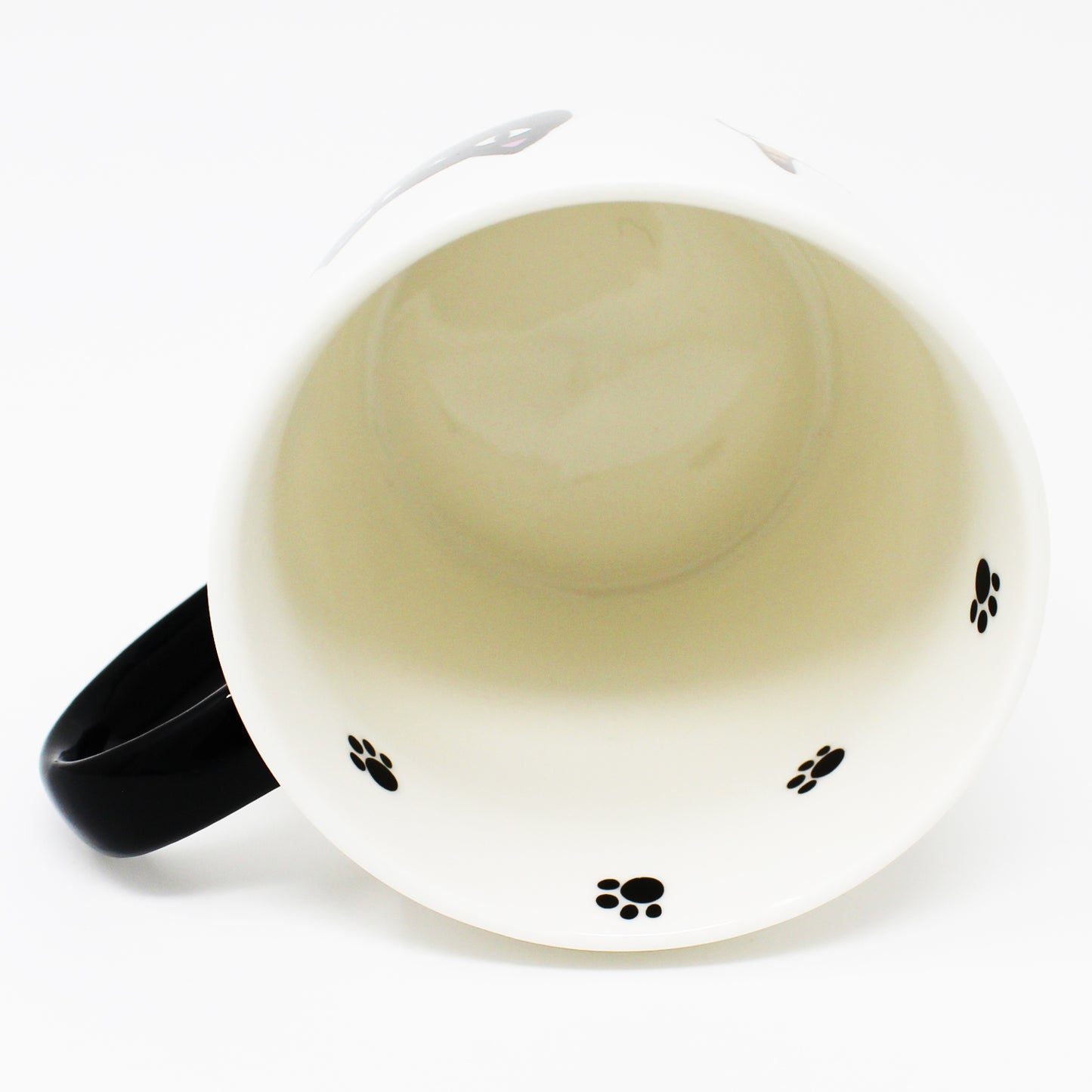 Inside of mug featuring black cat paw print – Nyan-ya cat-themed ceramic design