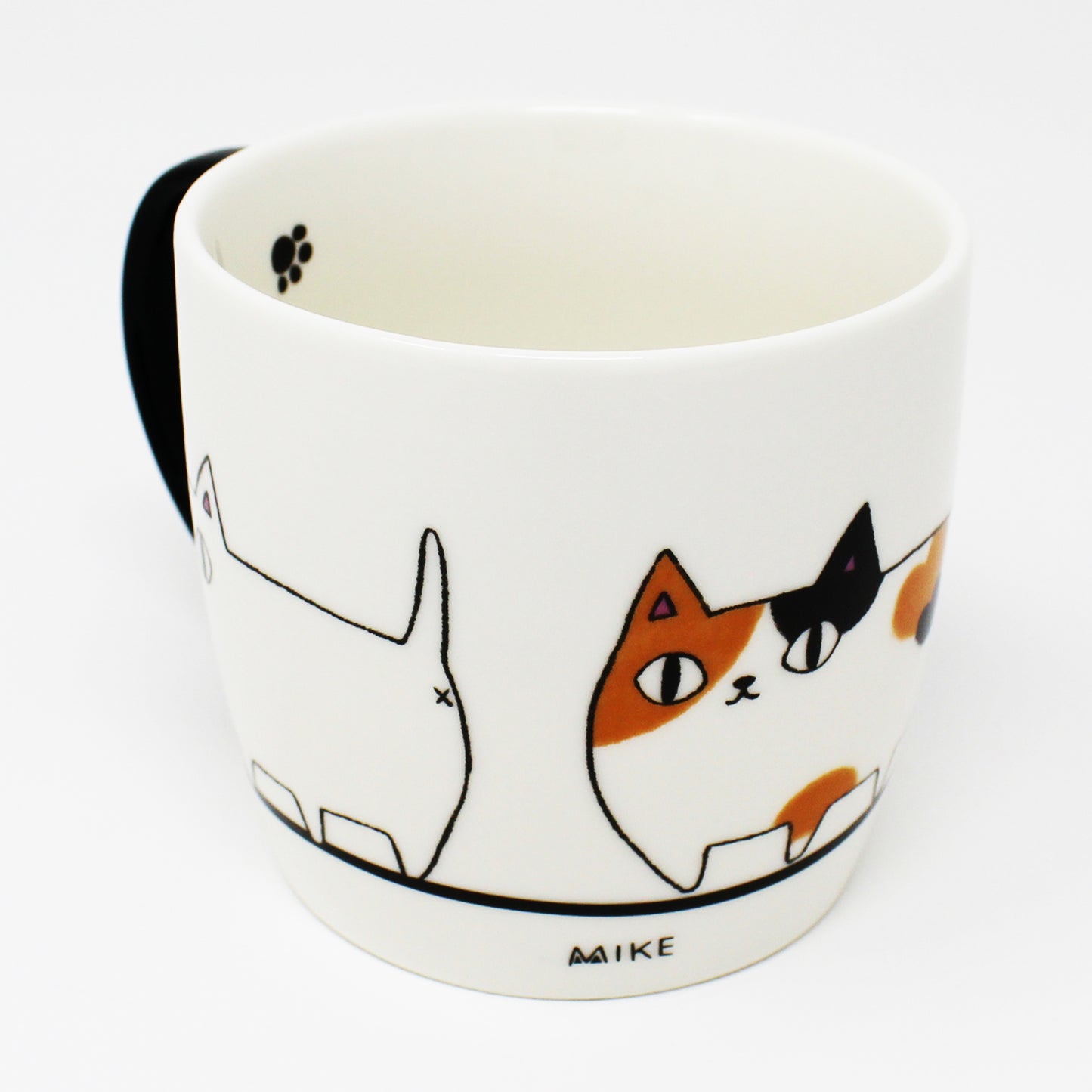 White porcelain mug with black handle and marching cat illustration – 3 Cat Brothers: Kuro, Shiro, Mile