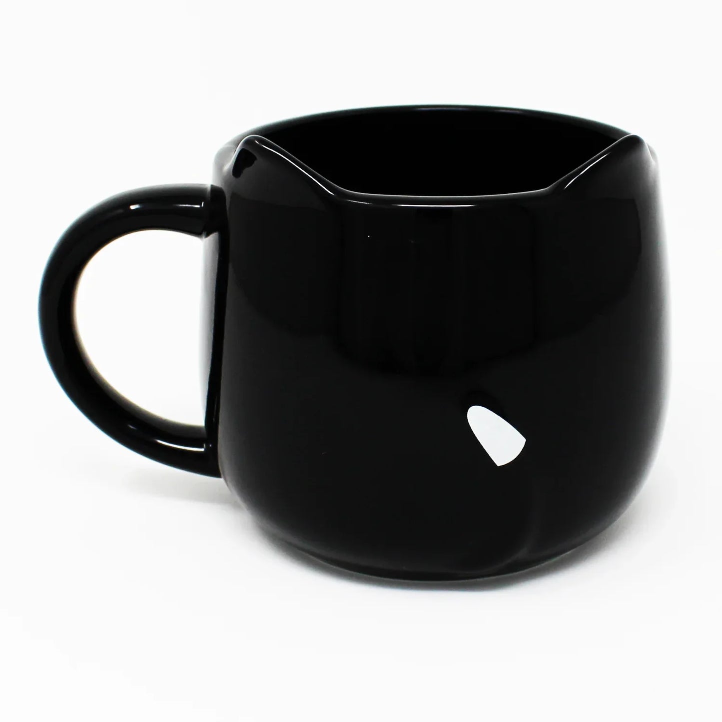 Side view of black cat mug showing 3D white-tipped tail handle – whimsical Japanese cat design