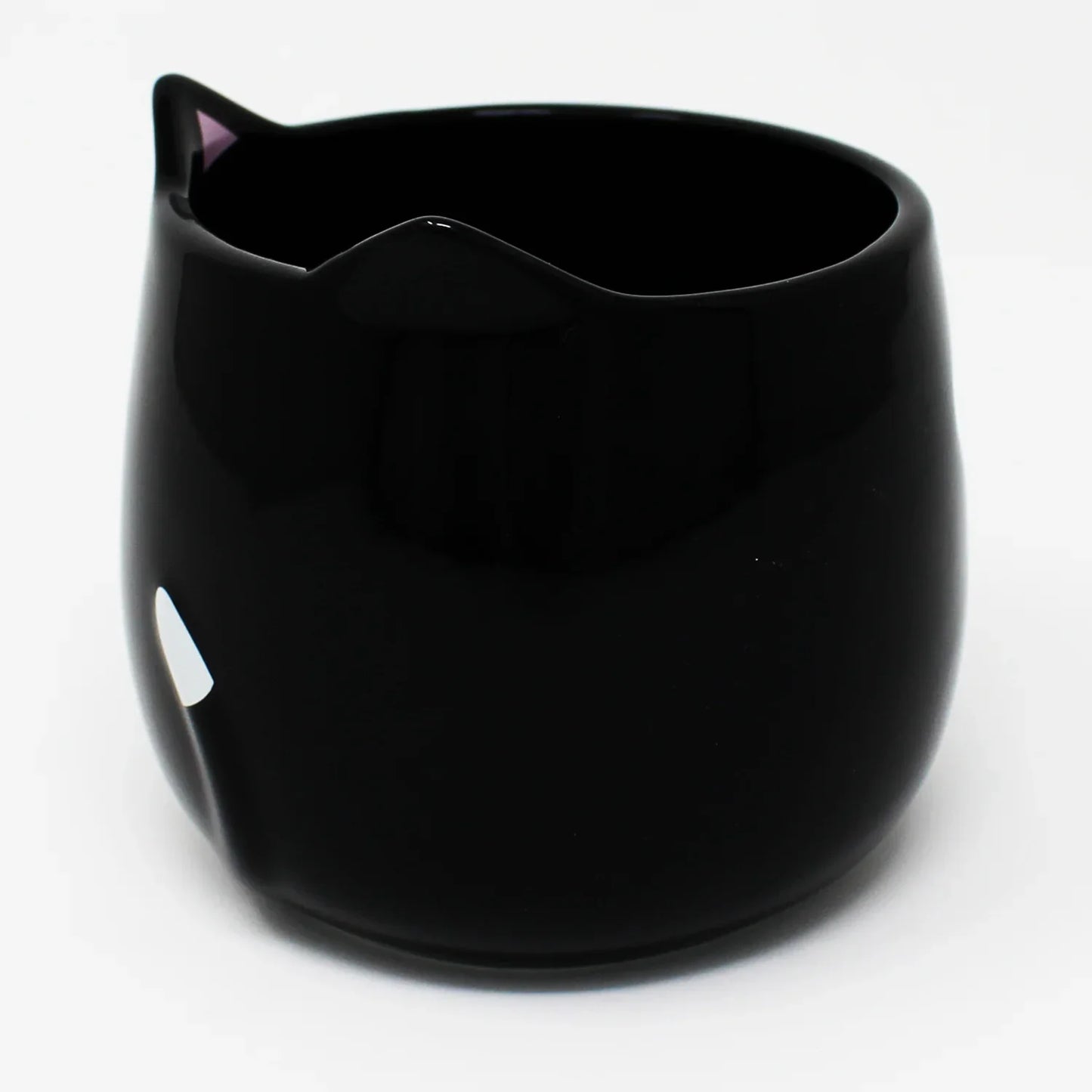 Side view of black cat mug showing 3D white-tipped tail handle – whimsical Japanese cat design