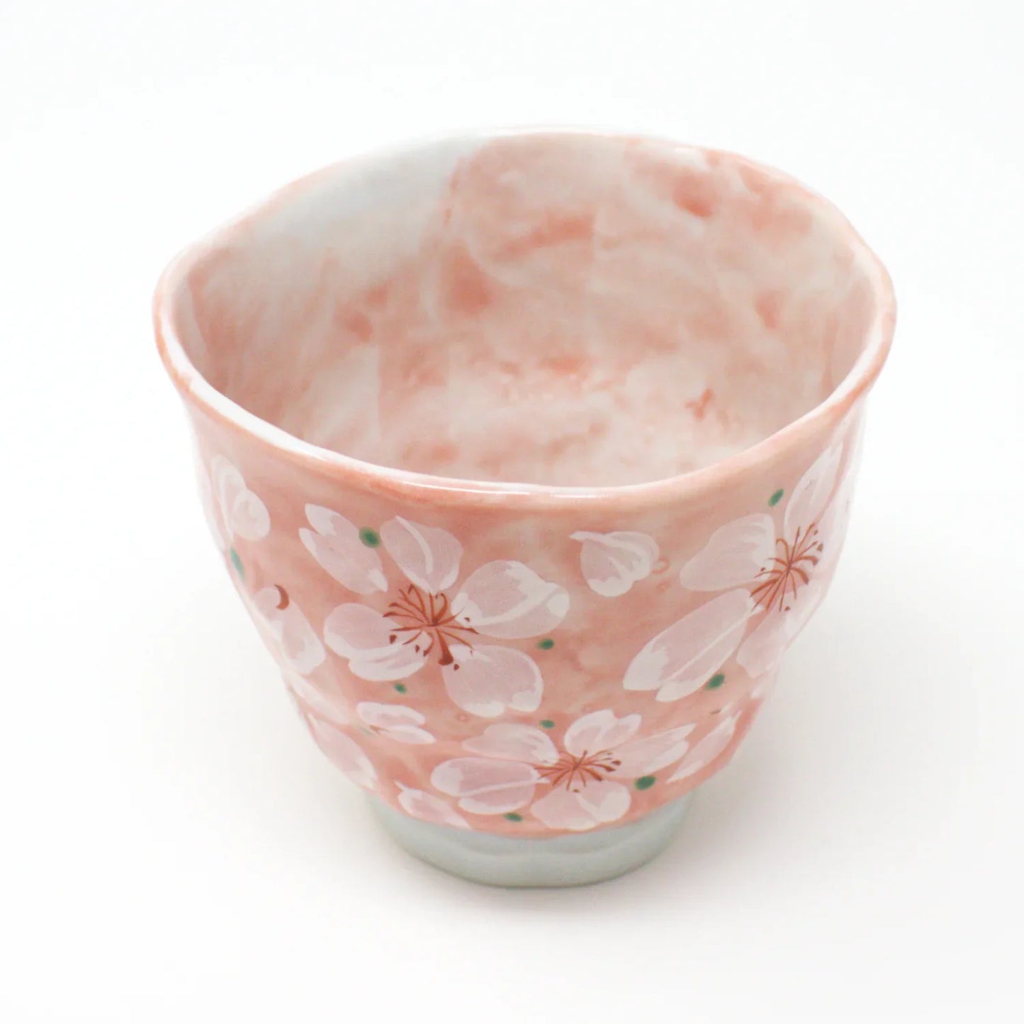 Close-up of cherry blossom details on Yayoihana Yunomi teacup, made using traditional Minoyaki techniques