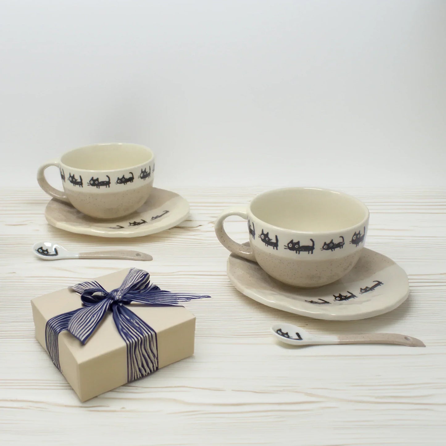 Handmade Japanese Mino Ware soup cup, spoon, and plate set with black cat illustrations – matching beige ceramic kitchenware gift for cat lovers