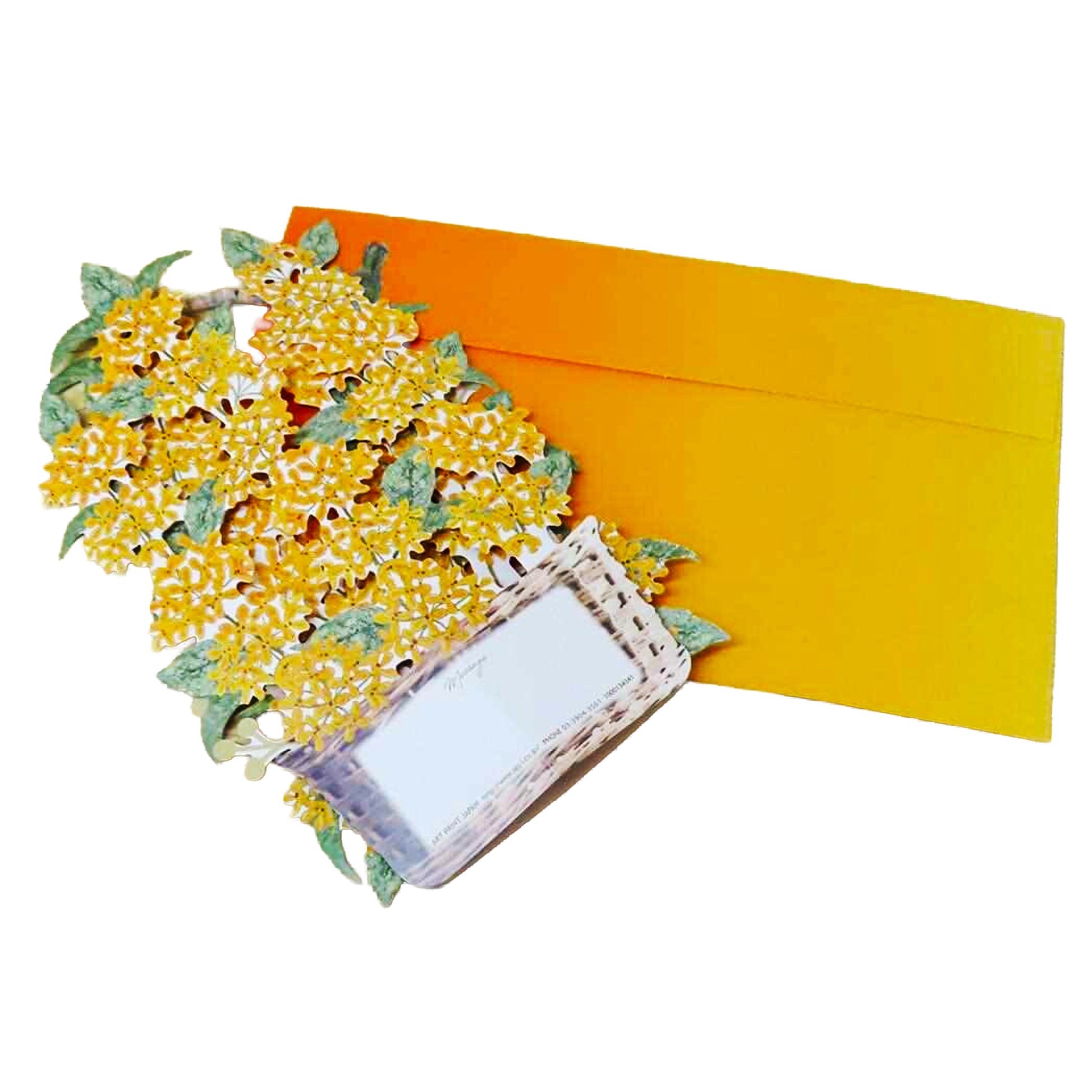 Yellow flowers in a wicker basket on an orange envelope with a white background