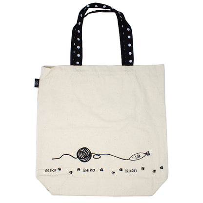 Back of canvas tote bag showing playful fish and yarn design from Nyan-ya series