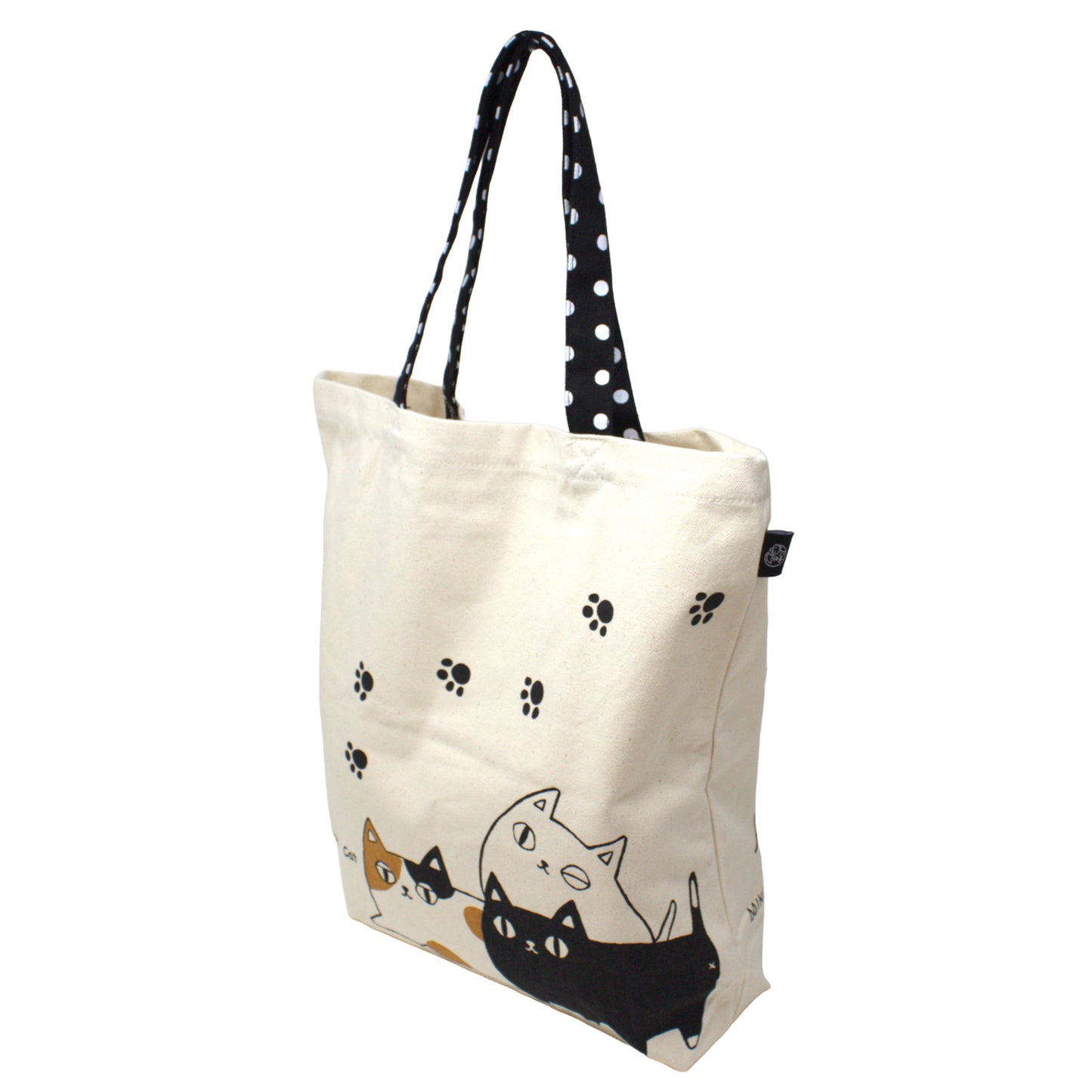 Model carrying 3 Cat Brothers Nyan-ya canvas tote bag to show size and everyday use