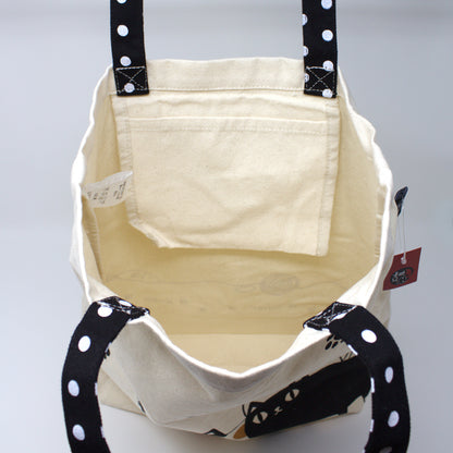 Interior of 3 Cat Brothers tote bag with open inner pocket, showcasing spacious and functional design