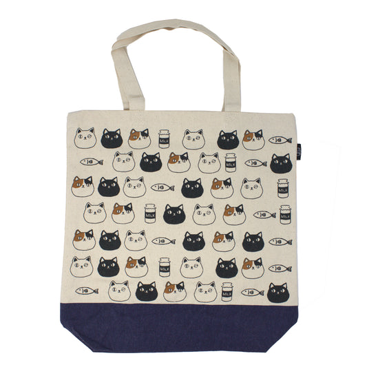 Canvas tote bag with cute cat faces of Shiro, Kuro, and Mike from the Nyan-ya series, featuring black polka dot handles and inner pocket – perfect for cat lovers.