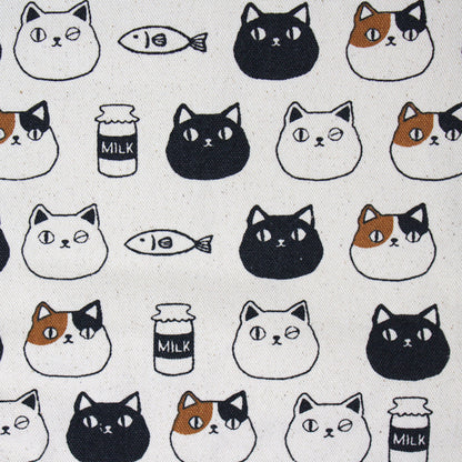 Canvas tote bag with cute cat faces of Shiro, Kuro, and Mike from the Nyan-ya series, featuring black polka dot handles and inner pocket – perfect for cat lovers.