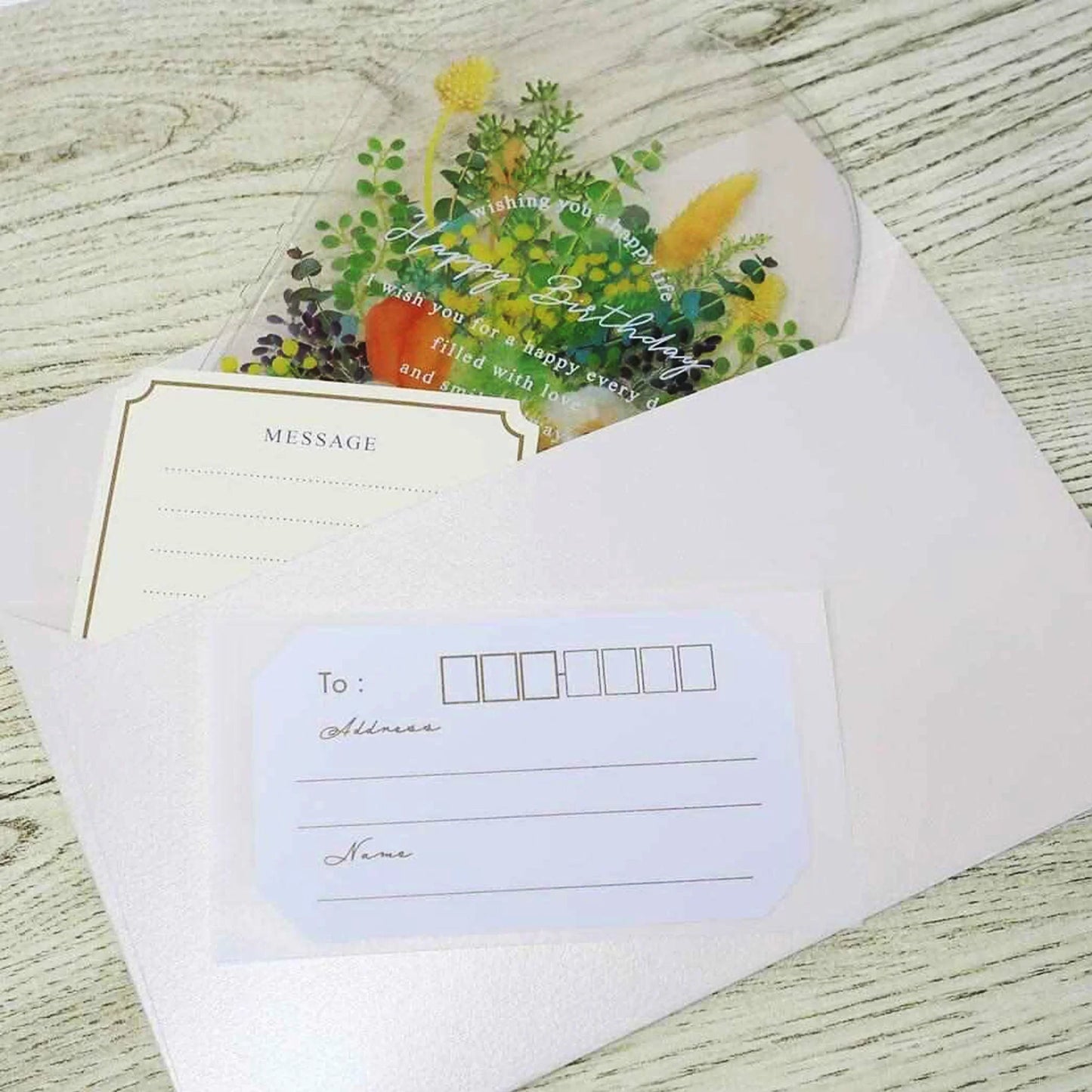 Floral Dome Pop-Up Card with Yellow Flowers – Transparent birthday card shaped like a glass bottle, includes mini message card and pearl cream envelope