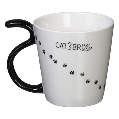 CAT3BROS mug with paw print trail and glossy black tail handle from the Three Neighbors series
