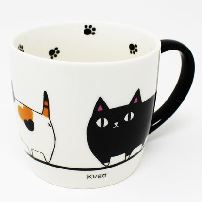 Inside of mug featuring black cat paw print – Nyan-ya cat-themed ceramic design