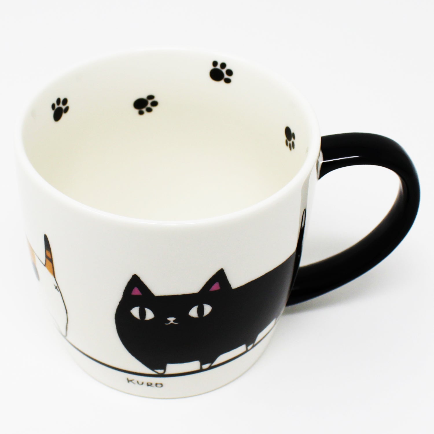 Inside of mug featuring black cat paw print – Nyan-ya cat-themed ceramic design