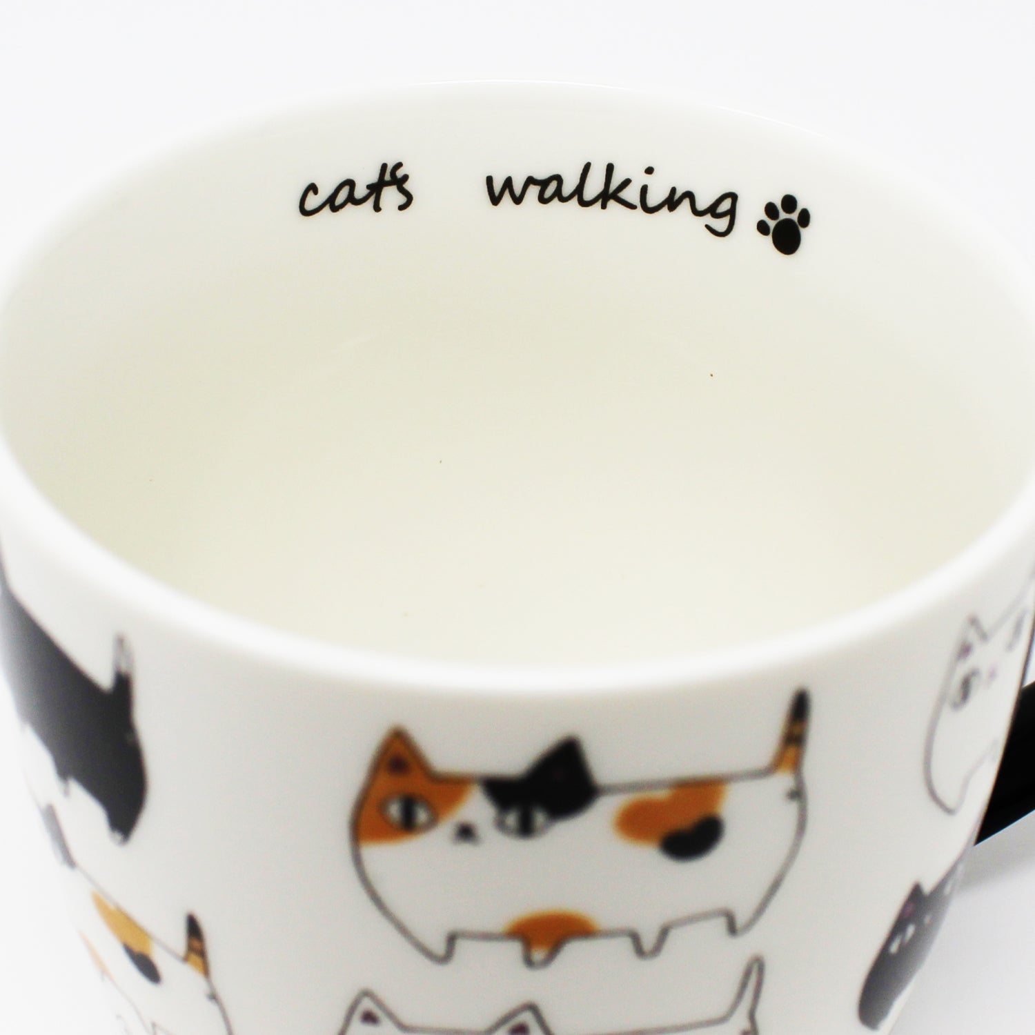 3 Cat Brothers Cat Parade Mug – White porcelain mug featuring Kuro, Shiro, and Mike marching around in a continuous pattern, with a black paw print inside and black handle – Nyan-ya Series from Japan