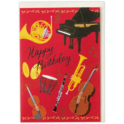 Birthday card with musical instruments on a red background