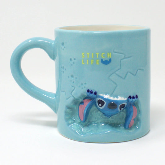 Light blue Disney Stitch mug with upside-down Stitch and cracked detail design