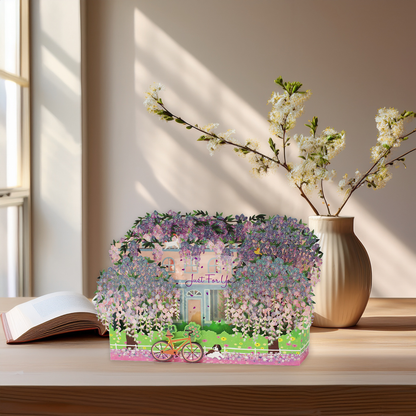Sparkling wisteria pop up card displayed on a table as an elegant floral keepsake